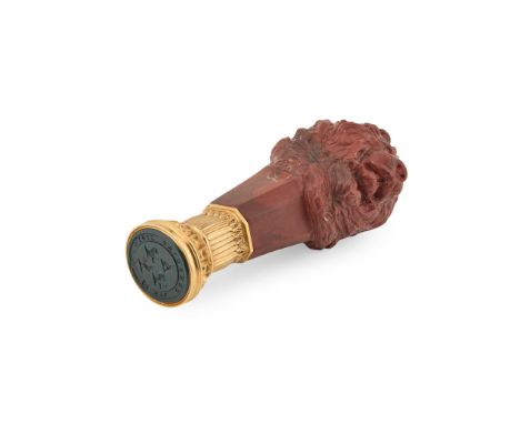  THE COLONEL CHARLES DE LAET WALDO-SIBTHORP SEAL A 19TH CENTURY HARDSTONE DESK SEAL The handle carved as a lion mask, to a fl