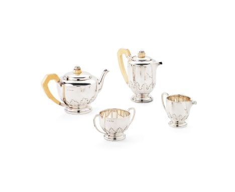  A 1930s FOUR PIECE TEA SERVICE BIRMINGHAM 1936 Comprising a teapot, waterpot, twin-handled sugar basin and milk jug, each of