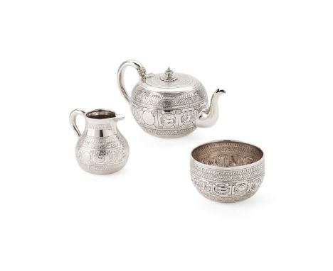  A MATCHED VICTORIAN BACHELOR'S ZODIAC THREE PIECE TEA SERVICE GEORGE FOX, LONDON 1874/5 Comprising a teapot, sugar basin and