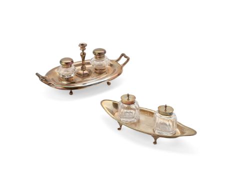  A VICTORIAN TWIN-HANDLED INK STAND HENRY WILKINSON & CO., SHEFFIELD 1861 Of oval outline, two glass ink bottles, and a taper