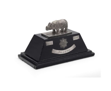  AN INDIAN PRESENTATION 'ASSAM VALLEY LIGHT HORSE' TROPHY UNMARKED Modelled as a rhinoceros surmounted a plinth with a presen