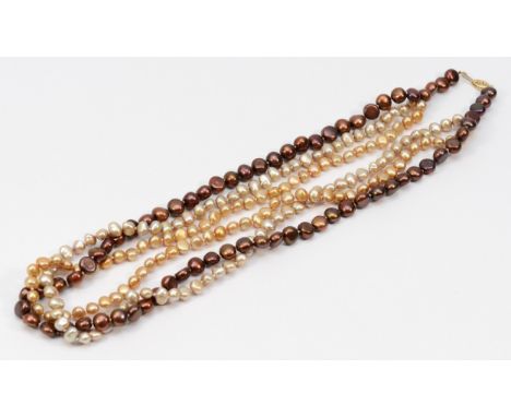 A three row baroque coloured cultured pearl twist necklace, 59cm. 