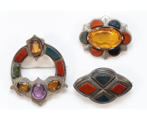 A Scottish silver and gemset Brooch, collet set with citrine and amethyst, panel set with carnelian and bloodstone (one repla