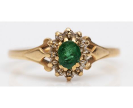 A 9ct gold emerald and diamond cluster ring, R, 2.5gm 