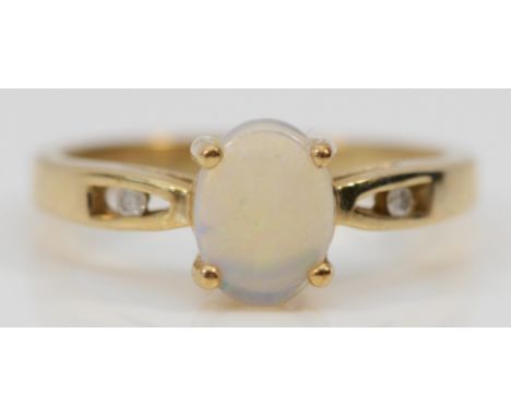 A 9ct gold opal single stone ring with diamond split shank, N, 2.5g 