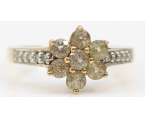 A 9ct gold yellow gemstone and diamond cluster ring, O, 2.4gm 