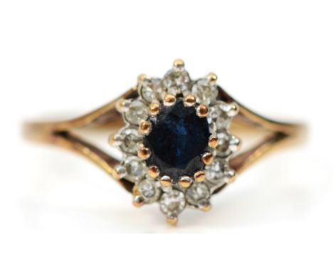 A 9ct gold sapphire and diamond cluster ring, K, 1.7gm 