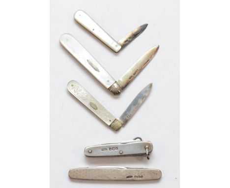 Three Victorian and later mother of pearl and silver fruit knives and two silver example 