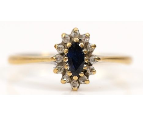 A 9ct gold diamond and sapphire cluster ring, K 1/2, 1.3g 