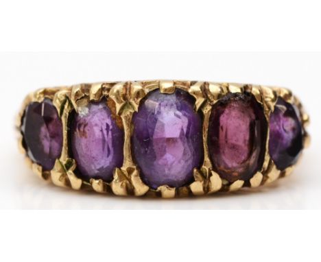 A vintage 9ct gold Victorian style five stone amethyst ring, carved setting, M, 4.6gm 