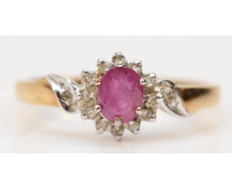 A 9ct gold ruby and diamond cluster ring, K 1/2, 1.8g 