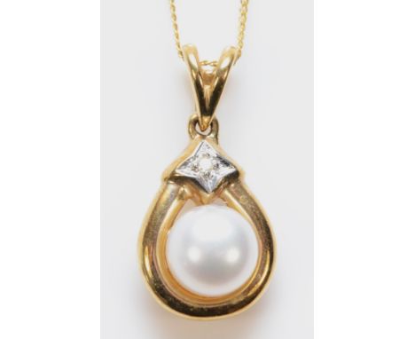 A 9ct gold cultured pearl and diamond pendant, 17mm, chain, 1.7gm 