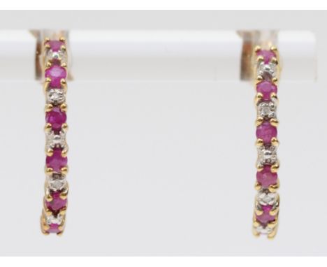 A 9ct gold pair of ruby and diamond ear hoops, 19mm, 1.7gm 