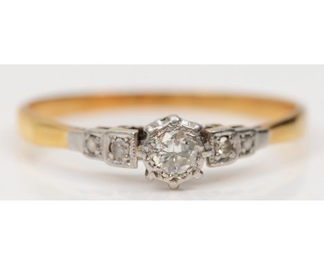 An 18ct gold and platinum round brilliant cut diamond, single stone ring, O 1/2, 1.6g 