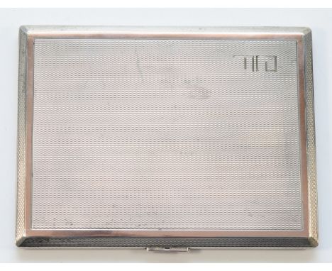 A silver engine turned cigarette case, London 1939, 11 x 8.5cm, 178gm 