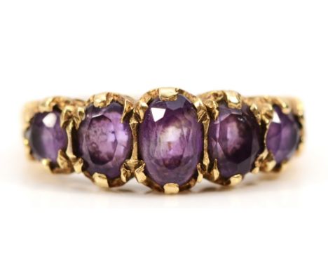 A 9ct gold amethyst five stone ring, H 1/2, 3g 