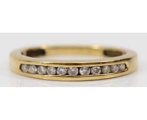 A 9ct gold diamond half eternity ring, channel set, K 1/2, 1.8g 