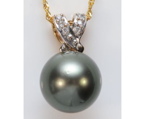 A 9ct gold white stone and 11 black cultured pearl pendant, chain, 4.6gm 