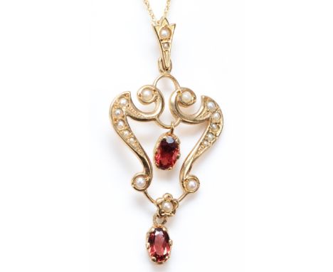 A Victorian style 9ct gold garnet and half pearl set openwork pendant, 40mm, chain, 3.4gm 