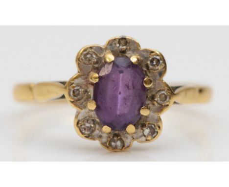 A vintage 18ct gold amethyst and diamond cluster ring, N 1/2, 2.5gm 