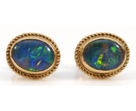 A 9ct gold and black opal doublet/triplet pair of ear studs 1.6gm 