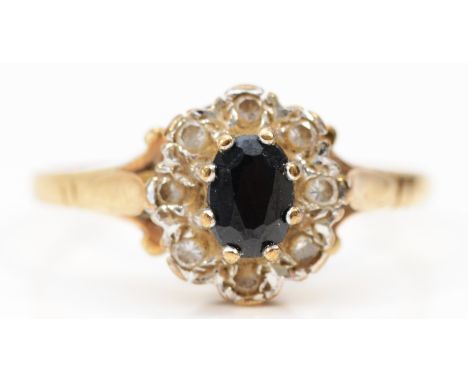 A 9ct gold sapphire and white gemstone cluster ring, R, 2.2gm 