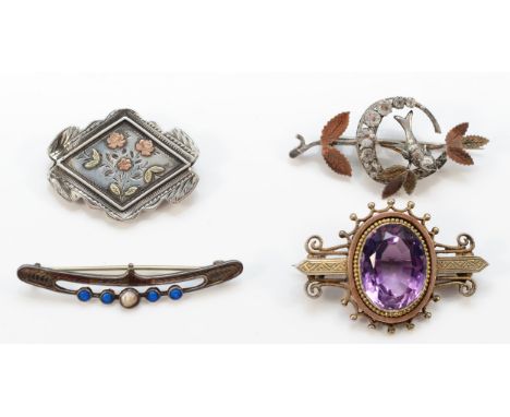 Charles Horner, a silver and enamel brooch, Chester 1912, a Victorian silver and amethyst brooch and two other brooches, 25gm