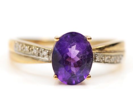 A 9ct gold amethyst single stone ring, of good colour, 9 x 7mm, diamond set shoulders, P, 2.5gm 