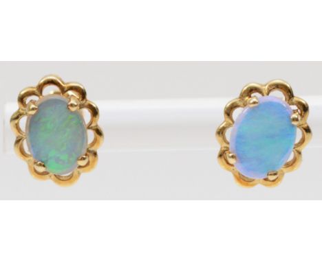 A 9ct gold pair of opal ear studs, stone 8 x 6mm, 1.8gm 