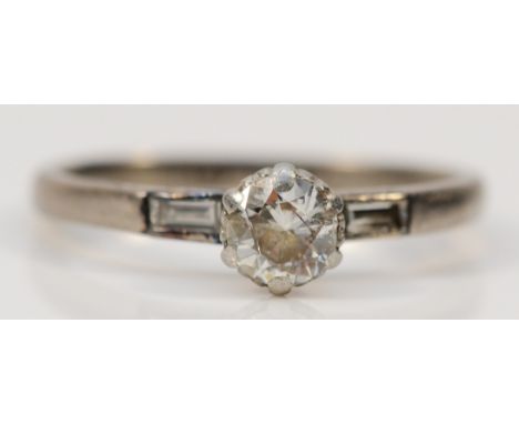 An Art Deco 18ct white gold and platinum single stone diamond ring, claw set with an old cut diamond ring, approximately 0.40