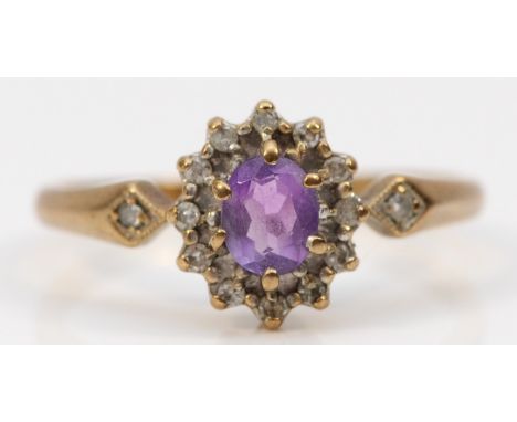 A 9ct gold amethyst and diamond cluster ring, M, 1.7gm 