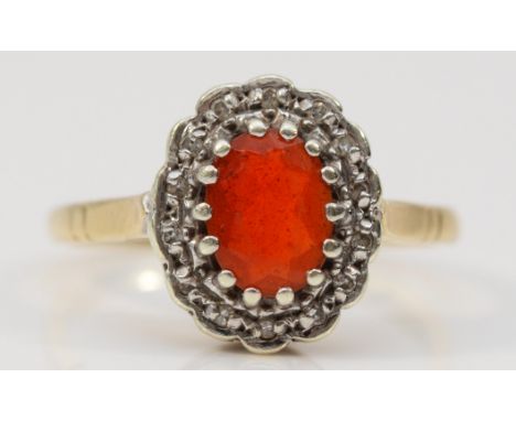 A vintage 9ct gold fire opal and diamond cluster ring, O 1/2, 2.8gm 