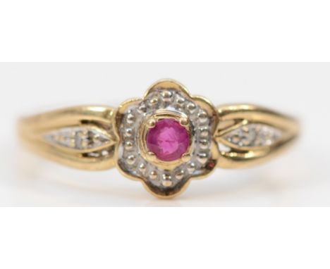 A 9ct gold diamond and ruby floral cluster ring, split band, O 1/2, 1.9g 