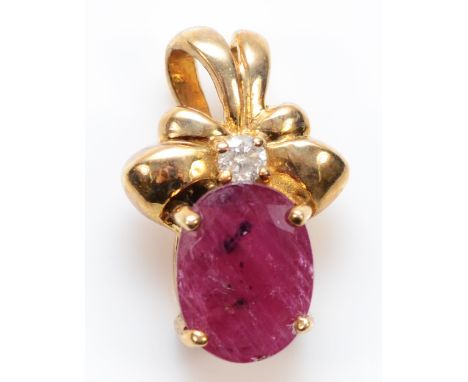 A 9ct gold ruby and brilliant cut diamond pendant, stone 9 x 7mm, 2.1gm 