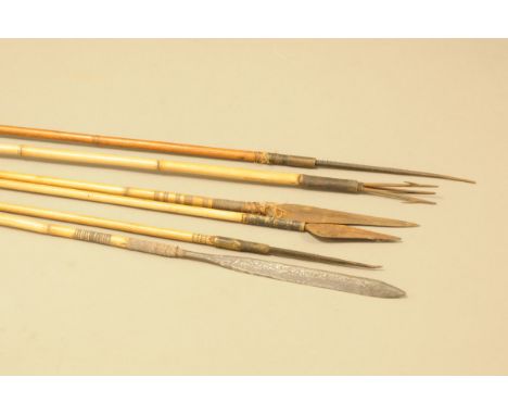 Six vintage tribal arrows, bamboo and other shafts, each with differing metal arrow head, longest 176cm (6) 