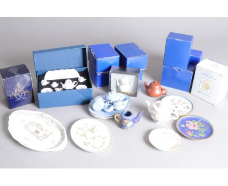 A quantity of miniature collectors' chinaware to include cups and saucers by Royal Worcester,  Coalport and Wedgwood, togethe