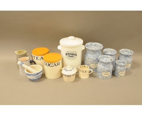 A collection of kitchen ceramics, including Bridgewater pottery tea and sugar jars, and a covered sugar basin and chocolate m