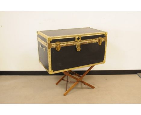 A mid 20th century travel trunk, 90cm wide, together with a folding luggage stand (2) 