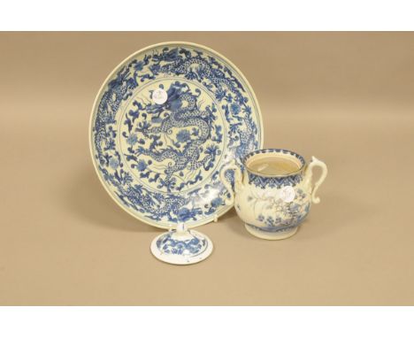A mid 20th century Chinese blue and white porcelain charger, 29.5cm, together with a twin handled Chinese blue and white porc