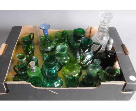 A box of Victorian and later green glass jugs and other glassware, some with pretty enamel decoration, along with a green gla