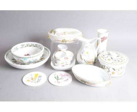A group of Royal Worcester Evesham pattern items and Portmerion Pottery Botanic Garden items  