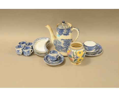 A mid 20th century Poole pottery studio floral painted vase, together with a small group of blue and white pottery 