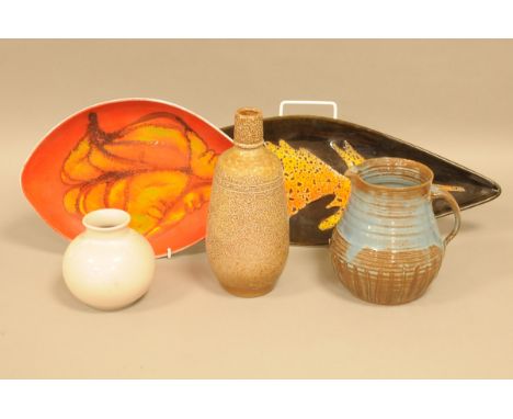 Two c1960s Poole studio pottery items, one a leaf shaped Aegean dish, 43cm, the other in red, together with a Poole pottery s