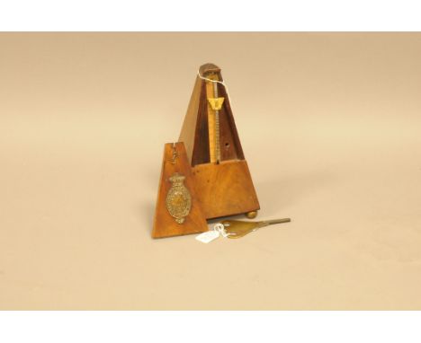 A Victorian or later metronome from R. Cooks of London, typical form with key