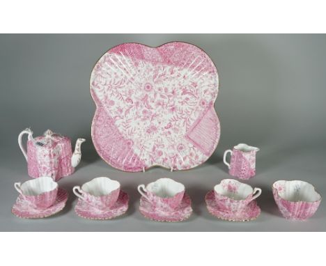 A Wileman &amp; Co. bone china cabaret set, late 19th century, printed in deep pink with panels of flowers and brocade patter