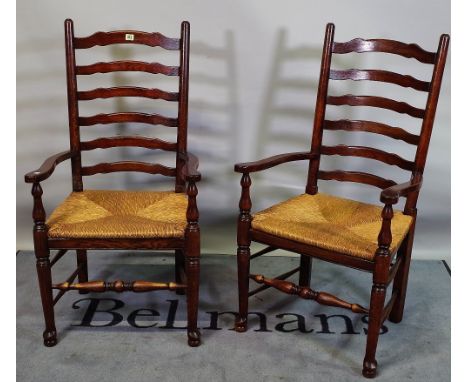 A set of eight 18th century style oak Lancashire ladder back dining chairs, to include two carvers, (8). 