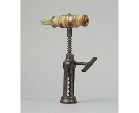 A mid 19th century, twin pillar open rack corkscrew with turned bone handle and brush, steel side handle and wire helix. 