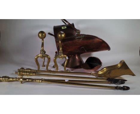 Collectables, including; a small brass andiron, brass fire tools and a copper log basket. 