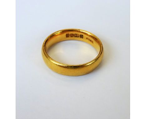 A 22ct gold plain wedding ring, Birmingham 1929, ring size J and a half, weight 5.3 gms.