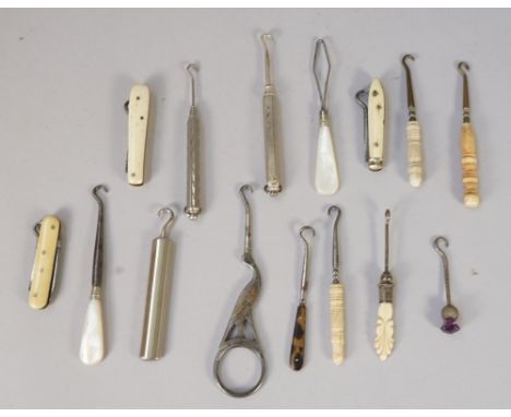 A small collection of miniature novelty button hooks and related collectables, mother-of-pearl, white metal and ivory, (15)
